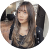long dark brown layered hair and bangs